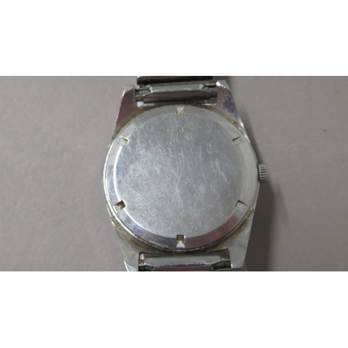 309 - ZENITH. 50's/60's plain steel. 35mm. Arabic numerals. Manual nicely aged. Original button. Working i... 