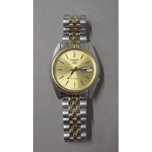 311 - SEIKO. Automatic. Modern gold dial. 35mm. Day date, working in saleroom. Spare links