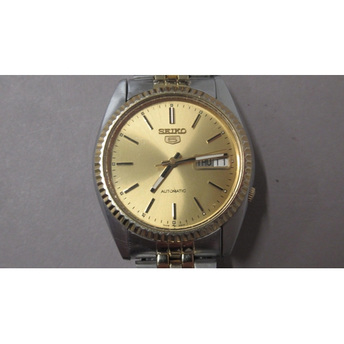 311 - SEIKO. Automatic. Modern gold dial. 35mm. Day date, working in saleroom. Spare links