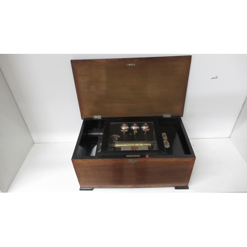 402A - A 19th century rosewood and inlaid music box on three bells and butterflies - in working order, teet... 