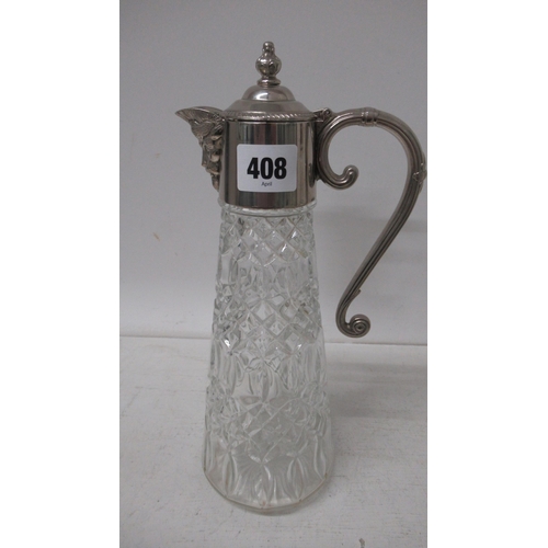 408 - Two silver plated topped claret jugs