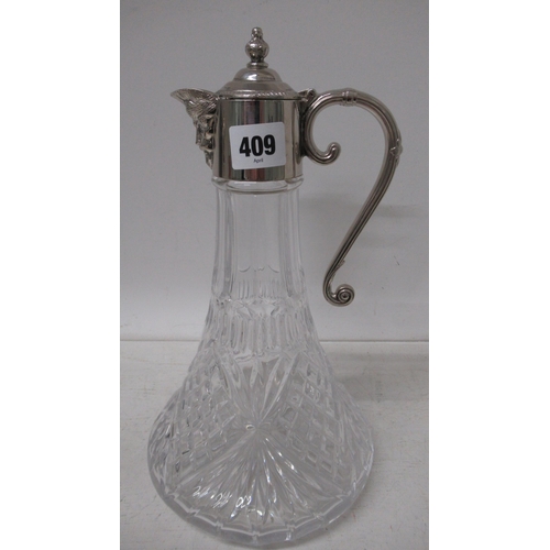 408 - Two silver plated topped claret jugs