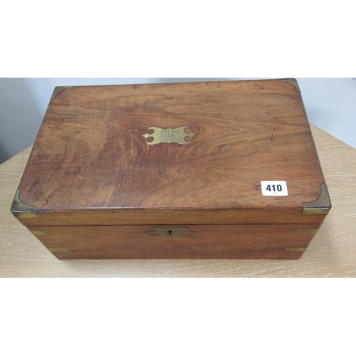 410 - A 19th century walnut writing slope with brass inlay and corners