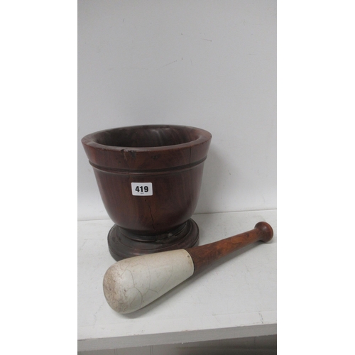 419 - A 19th century hardwood pestle and mortar