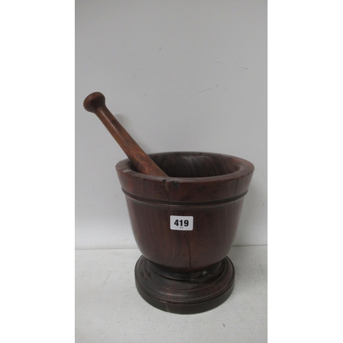 419 - A 19th century hardwood pestle and mortar