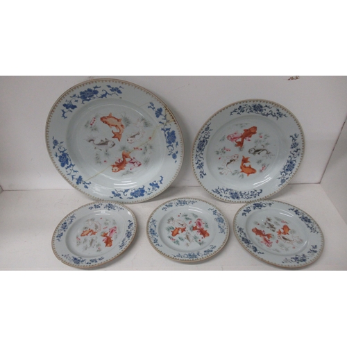 443 - Five 18th/19th century Chinese Famille Rose dishes with fish - each damaged/repaired - graduated siz... 