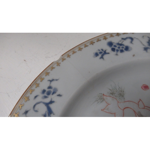 443 - Five 18th/19th century Chinese Famille Rose dishes with fish - each damaged/repaired - graduated siz... 