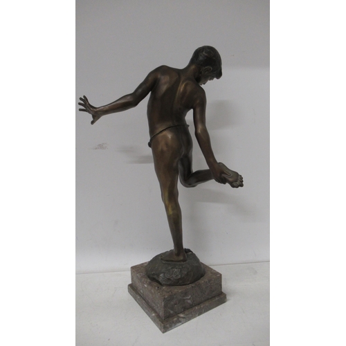 450 - A bronze figure of a boy with crab signed Delotto - Annibale De Lotto - good patina on square grey m... 