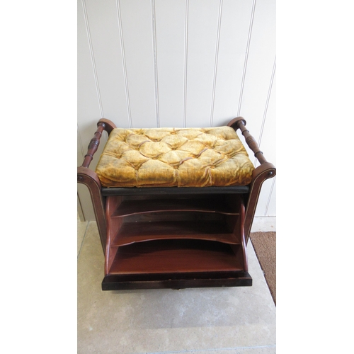 600 - An Edwardian mahogany and inlaid music stool with a fall front