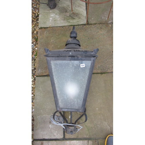 628 - A 19th century style iron and tin lamp post top