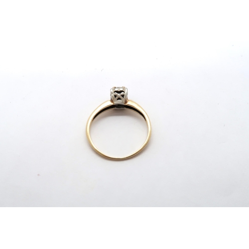 68 - An illusion set 14ct yellow gold and diamond solitaire ring with chip - ring size M - 1.9 grams