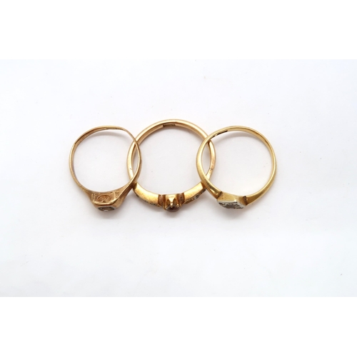 72 - Three 18ct (hallmarked) yellow gold and diamond rings for repair - stone missing, bent etc - ring si... 