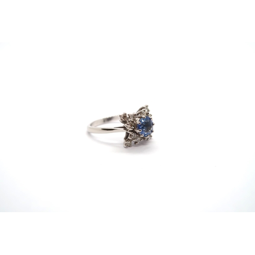 34 - A platinum bespoke hand made sapphire and diamond ring - diamonds bright and lively - head size appr... 