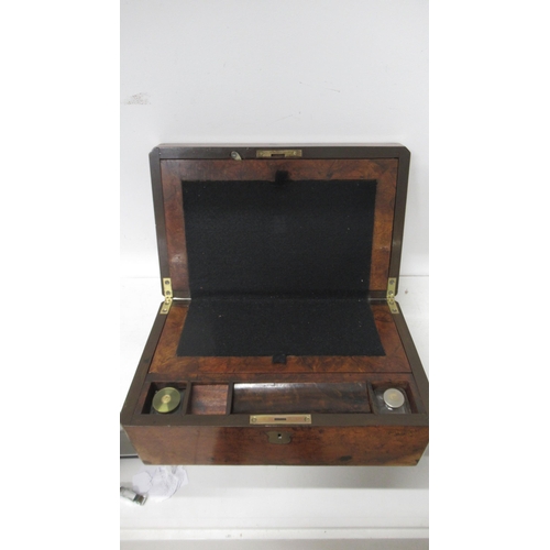 611 - A 19th century burr walnut writing box with a fitted interior with two inkwells - Width 40cm