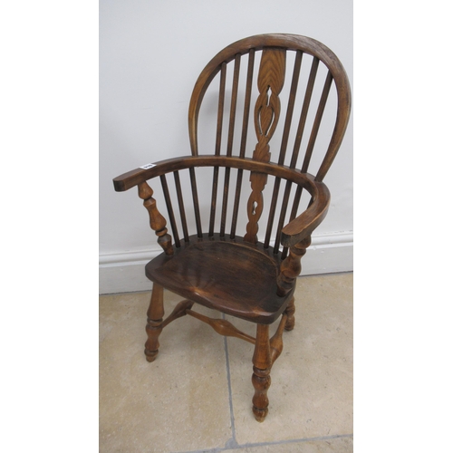 614 - A child's Windsor armchair