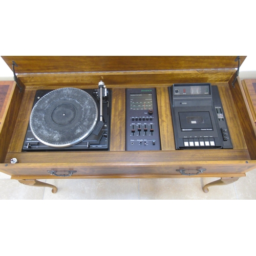 616 - A Dynatron Record Player tuner and cassette recorder in a yew veneer cabinet - Width 98cm