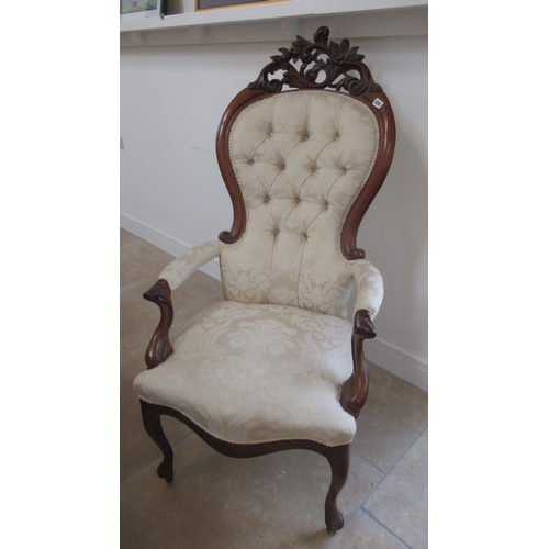 626 - A Victorian style spoon back armchair - in good condition