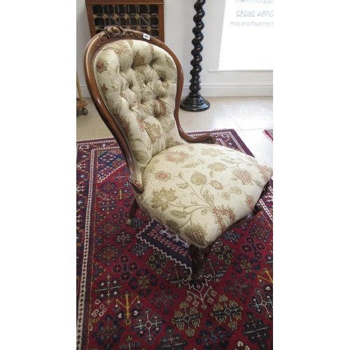 627 - A 19th century mahogany nursing chair, nicely upholstered, in good condition