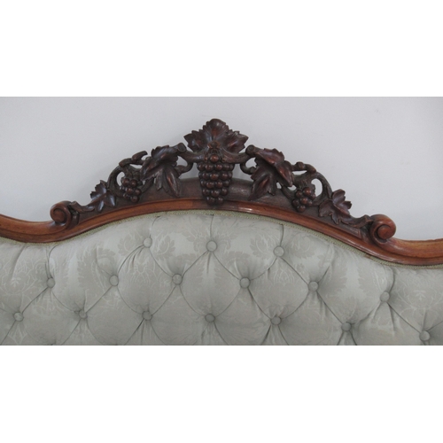 638 - A 19thc walnut continental framed settee with a buttoned back, nicely upholstered and in good condit... 