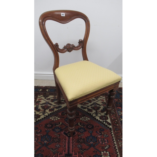 643 - A 19th century balloon back chair