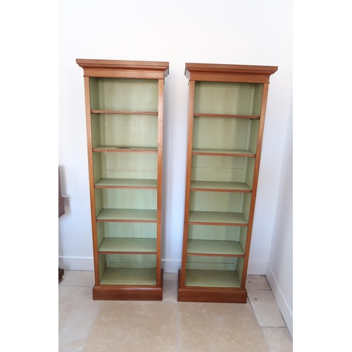 612A - A pair of slim walnut bookcases with five adjustable shelves - 180cm x 52cm x 26cm deep- made by a l... 