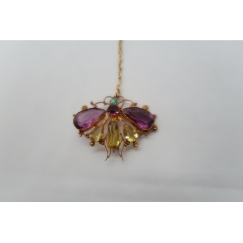 70 - A Victorian amethyst and citrine butterfly shaped brooch, approx 3cm, approx 3.2 grams