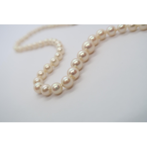 71 - A string of graduated pearls with a 9ct hallmarked yellow gold and cabochon amethyst clasp, approx 4... 