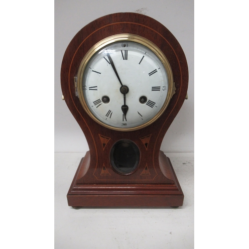 618 - A balloon shape 8 day striking mantel clock