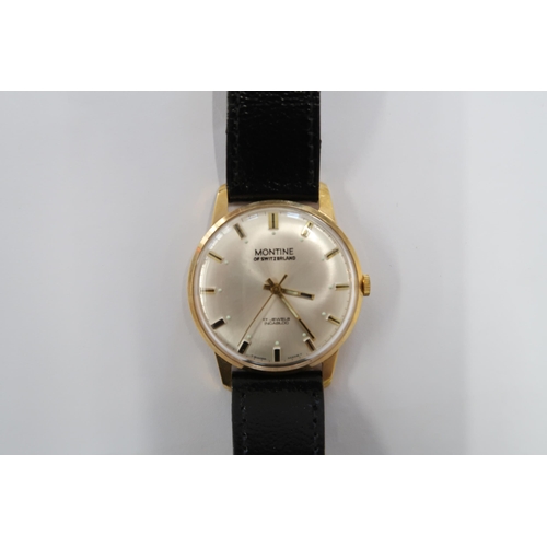 A Gents Montine automatic watch on a black leather strap, running in saleroom