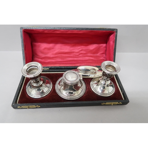 374 - A pair of hallmarked candlesticks 1911 and Capstan inkwell and blotter