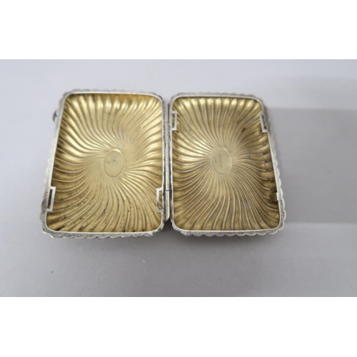 376 - A silver cigarette case with ribbed decoration, approx 2.6 troy oz