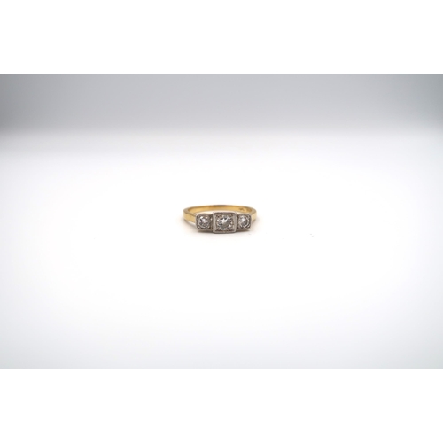 45 - A brilliant cut diamond three stone ring. Estimated total diamond weight 0.50ct. Estimated H/I colou... 