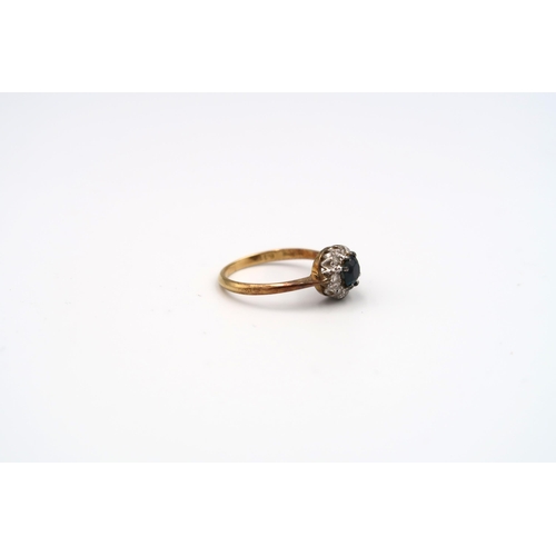 47 - An old cut diamond daisy cluster ring with a diamond to each shoulder. Estimated total weight 0.50ct... 