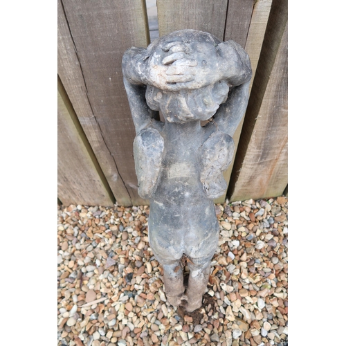 479 - A lead garden figure of a cherub, 70cm high