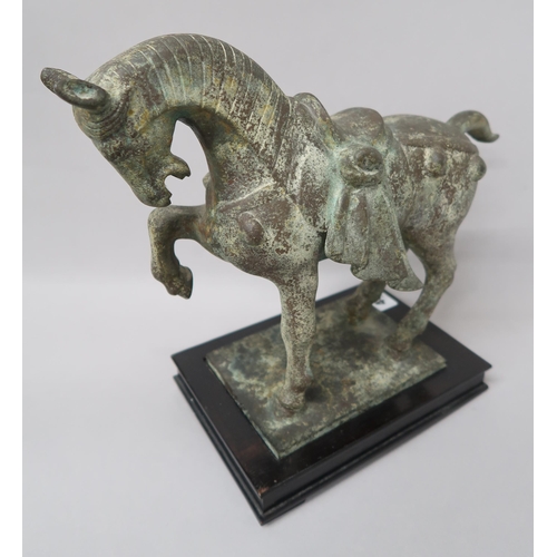 481 - A bronze horse on stand - 27cm