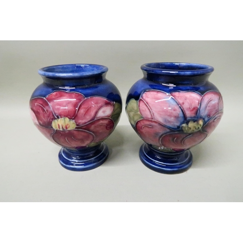 487A - Moorcroft Pottery - Two items, blue background - approx Height 9cm x Diameter 8cm