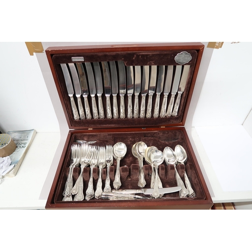 489 - A canteen of Kings Pattern cutlery in a case