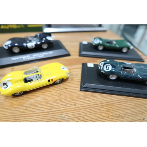 492 - An Autoart Classic Division 1:18 model D type Jaguar, (boxed), an Autoart Jaguar XJB, a Tyrrell P34 ... 