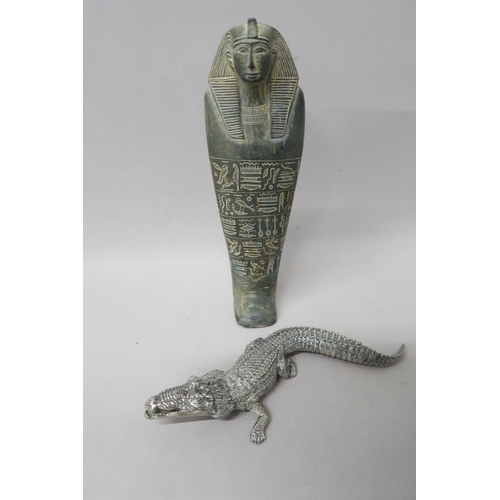 504 - A white metal crocodile, 16.5cm in length, a stoneware sarcophagus decorated with hydroglyphics