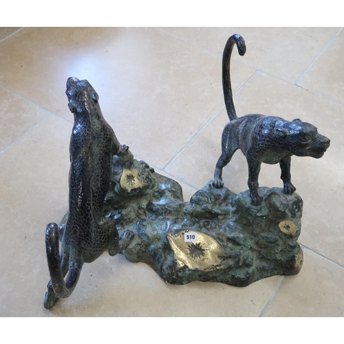 510 - A large bronze sculpture of opposing Jaguars climbing tree stump, signature to one corner - Height 4... 