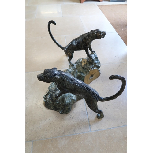 510 - A large bronze sculpture of opposing Jaguars climbing tree stump, signature to one corner - Height 4... 