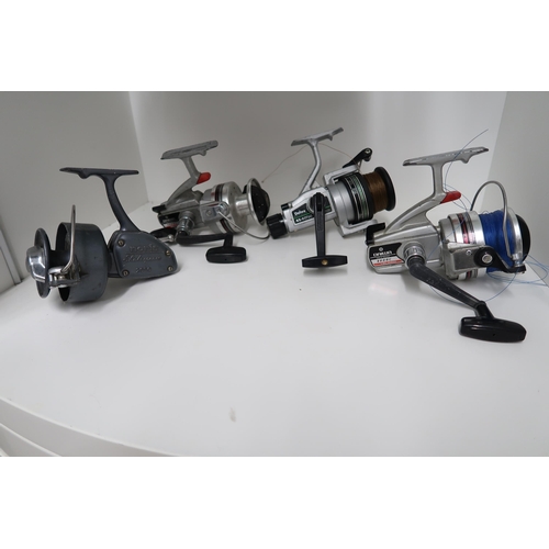 516 - Two Diawa 4000c fishing reels, Diawa AS4050 reel and a Norris Shakespear 2050 reel