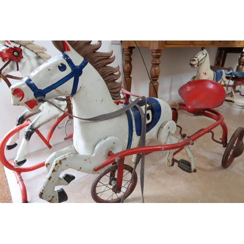 552 - A 20th Century Metal Tramp Horse and wagon, 110 cm long x 50 cm wide x 73 cm high.