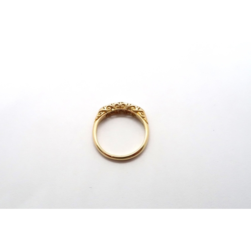 60 - An 18ct yellow gold Edwardian 5 stone diamond ring, diamonds are well matched, head size approx 16mm... 