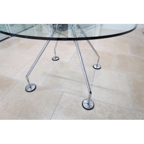 623 - A Norman Foster circular glass topped table with chrome legs - Diameter 120cm x Height 75cm