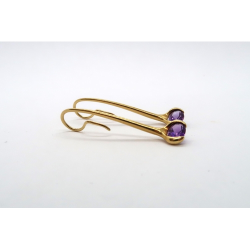 64 - A pair of 18ct Yellow Gold drop earrings with oval cut amethysts, approx. 3.9 grams.