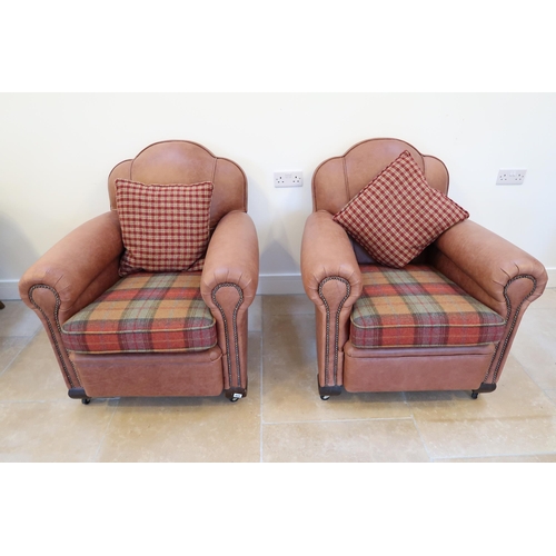 644 - A pair of 1920s Art Deco armchairs recently recovered in leather and in nice condition