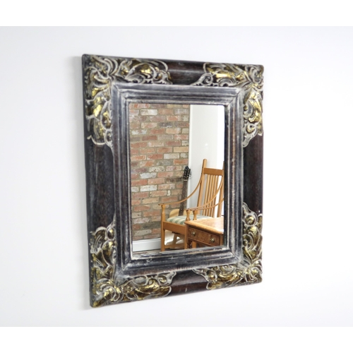 658 - A decorative modern mirror - 59cm x 49cm