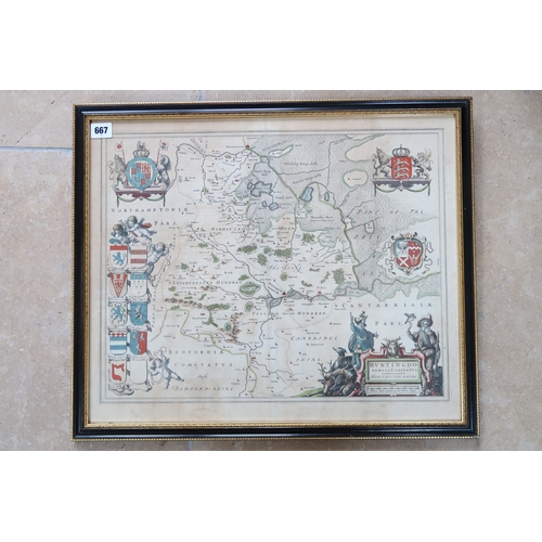 667 - A framed map of Huntingdonshire by Blaeu - double sided - 53cm x 44cm - 1647