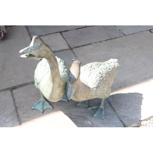 690 - A pair of bronze geese - Largest Height 74cm x Length 60cm